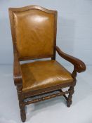 Antique hide seat armchair in oak