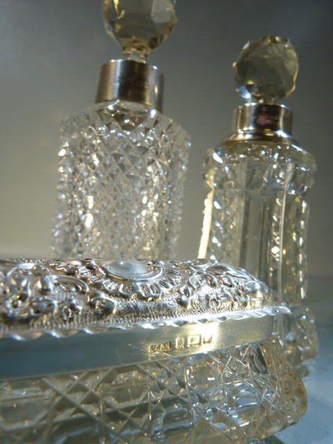 Two Cut glass silver collared scent bottles and a silver lidded dressing jar. - Image 2 of 3