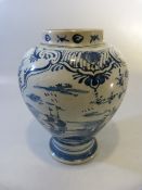 Mid 18th Century baluster Delft Tobacco/Tea jar. Decorated in underglaze blue with a central panel