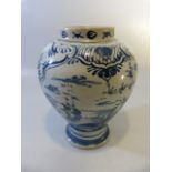 Mid 18th Century baluster Delft Tobacco/Tea jar. Decorated in underglaze blue with a central panel