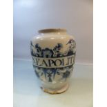 Dutch delft tobacco / Apothecary jar with underglaze blue decorated front. 'Neapoliti' surrounded by