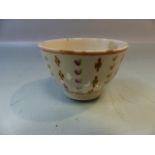 Miniature possibly Bow (unmarked) Sake cup. Decorated in underglaze Ochre, Green and Pink with