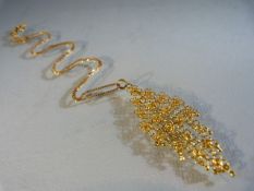 Gold Necklace with Indian style pendant both marked "18K" (total weight approx 6.3g)