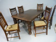 Heavily carved oak table in the Gothic Revival manner with twist mechanism and extra leaf. Along