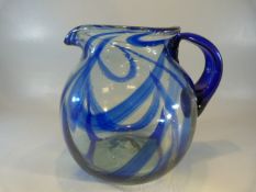 Large Baluster glass water jug with blue trailing glass through out. Applied Bristol blue coloured