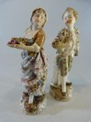 Unusual pair of German Porcelain miniatures of a lady and man. Both with blue markings to base.