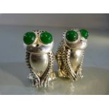 Pair of 800 silver condiments in the form of frogs with glass eyes