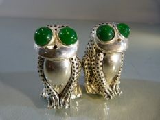 Pair of 800 silver condiments in the form of frogs with glass eyes