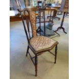 Antique mahogany side chair with turned wooden spindle back