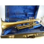 A vintage 20th Century trumpet / bugle with incised ' B&M Champion ' to the horn section, within a