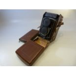 Rolleicord camera in leather case 1594705 along with matching leather case containing fittings