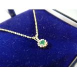 14ct yellow gold emerald and diamond daisy shaped pendant necklace