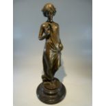 Art Deco Style Bronze of a lady looking at a posy of flowers, signed Pittaluga, Height (including