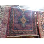 Old Baluchi carpet measuring approx 134 x 90cm