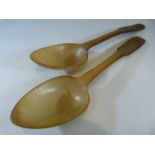 Early near pair of horn carved serving spoons. The bowls of triangular deep form with long