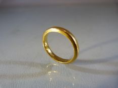 Gold Wedding band hallmarks rubbed but tests as 18ct or above (total weight approx 5.8g)