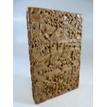 A late 19th century Chinese carved wooden card case with a detachable lid, profusely decorated
