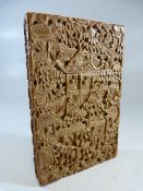 A late 19th century Chinese carved wooden card case with a detachable lid, profusely decorated