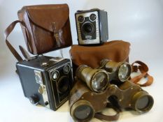 Two Kodak brownie cameras in cases, Pair of Opera Glasses, and one other Military type binoculars