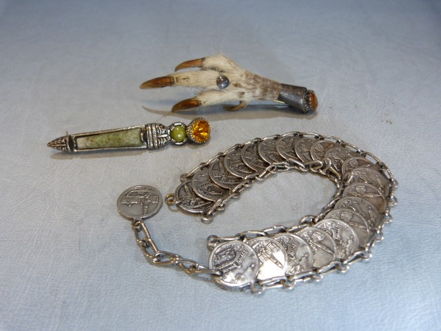 Three pieces of silver jewellery to include a Venezia coin bracelet, Vintage Rabbit claw with