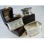 Four Hallmarked silver napkin rings - two boxed. Approx weight - 63.8g