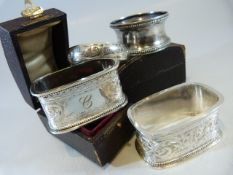 Four Hallmarked silver napkin rings - two boxed. Approx weight - 63.8g