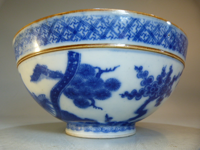 A Chinese bowl decorated in Blue and White with flowers and a two men in a sailing boat with a - Image 4 of 13