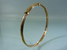 9ct yellow Gold bangle in case. approx weight - 1.8g