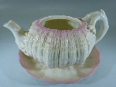 BELLEEK - Sea Urchin teapot (missing cover) and one saucer.