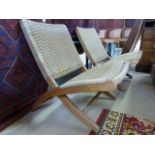 Pair of Folding teak and wicker upholstered recliner chairs