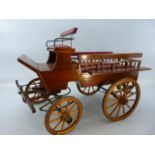 Handmade model of a horse drawn carriage