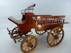 Handmade model of a horse drawn carriage