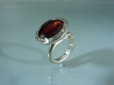 Substantial silver and Almandine Garnet surrounded by Diamonds