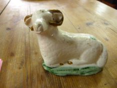 18th Century figure of a Recumbent Ram, possible Whieldon C.1760. Facial detailing worn.