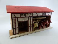 Erzgebirge German Democratic Republic carved wooden toy. CWW1 Stable block, with horses, cow and