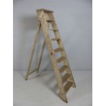 Set of vintage wooden stepladders