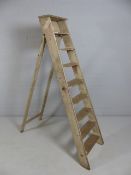 Set of vintage wooden stepladders