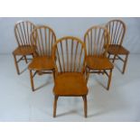 Set of five elm seated stick back chairs