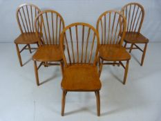 Set of five elm seated stick back chairs