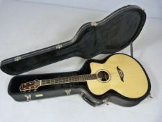 Turner electro accoustic guitar inlaid with mother of pearl and abalone, model number 85CE . in hard