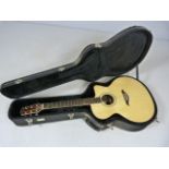 Turner electro accoustic guitar inlaid with mother of pearl and abalone, model number 85CE . in hard