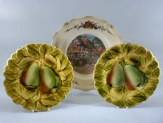 French Majolica plates by Sarreguemines decorated with pears, and another Obernai 'Faienceries