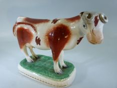 Early 19th Century Staffordshire Cow Creamer (missing lid).