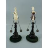 Pair of Dieppe Ivory French balancing toys c1820.