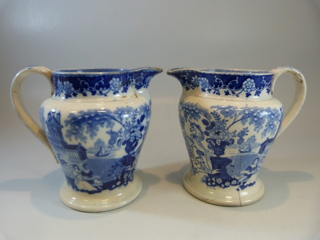 Pearlware - a pair of Antique c. 1825 transfer blue and white pouring jugs - printed with - Image 2 of 11