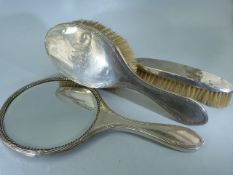 Hallmarked silver dressing table set A/F to include a Brush, small oblong brush and a hand held