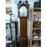 Early 19th century figured mahogany longcase clock, 30-hour movement with brass dial signed 'W.