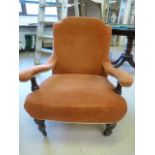 Antique open arm red upholstered bedroom chair on castors