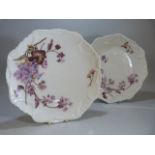 Two Antique Limoges plates c 1900. Decorated with printed flowers.