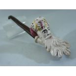 A Gambier mould clay pipe bowl, coloured enamel decoration of Jacob with wooden stem